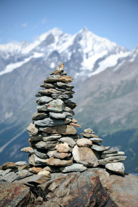 Stone cairn and mountain